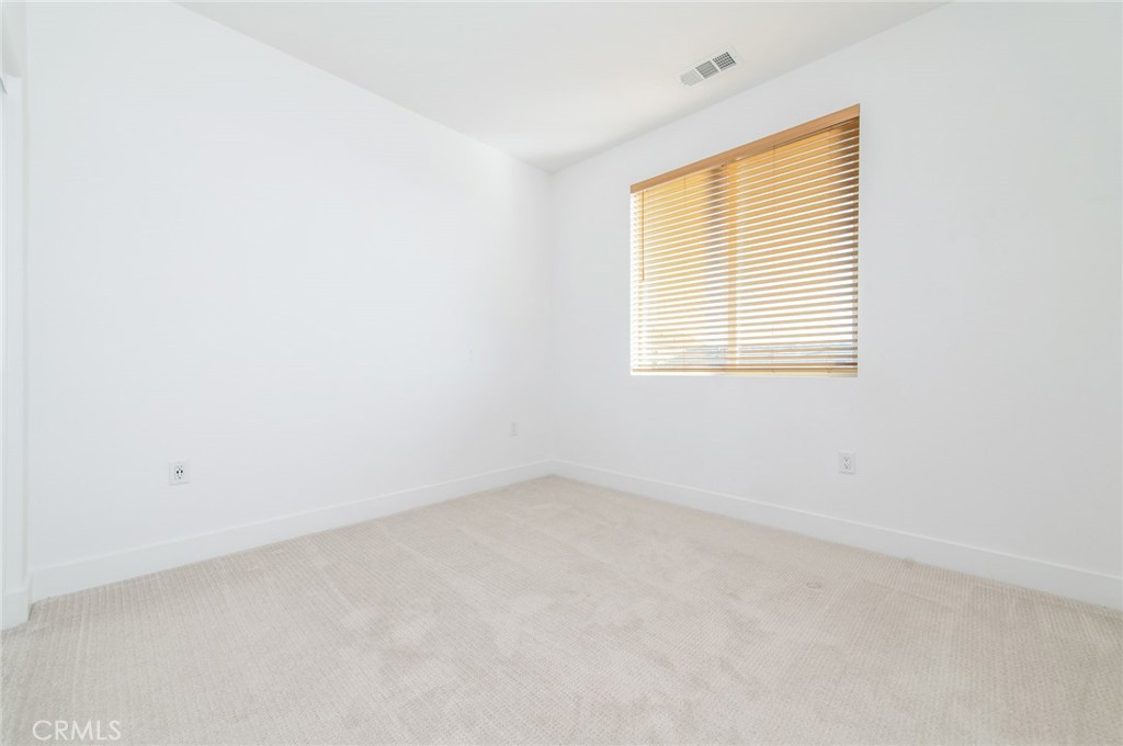 110 Seep Irvine, CA 92618 - Photo 26 of 37 an empty room with a window