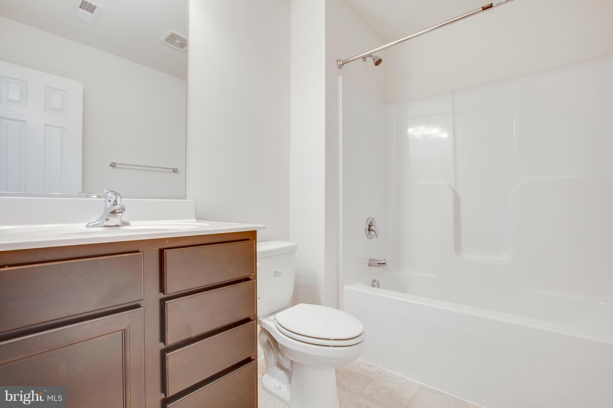 205 Azalea Road, Unit 80 Colonial Beach, VA 22443 - Photo 11 of 26 LOVELY HALLWAY BATHROOM
