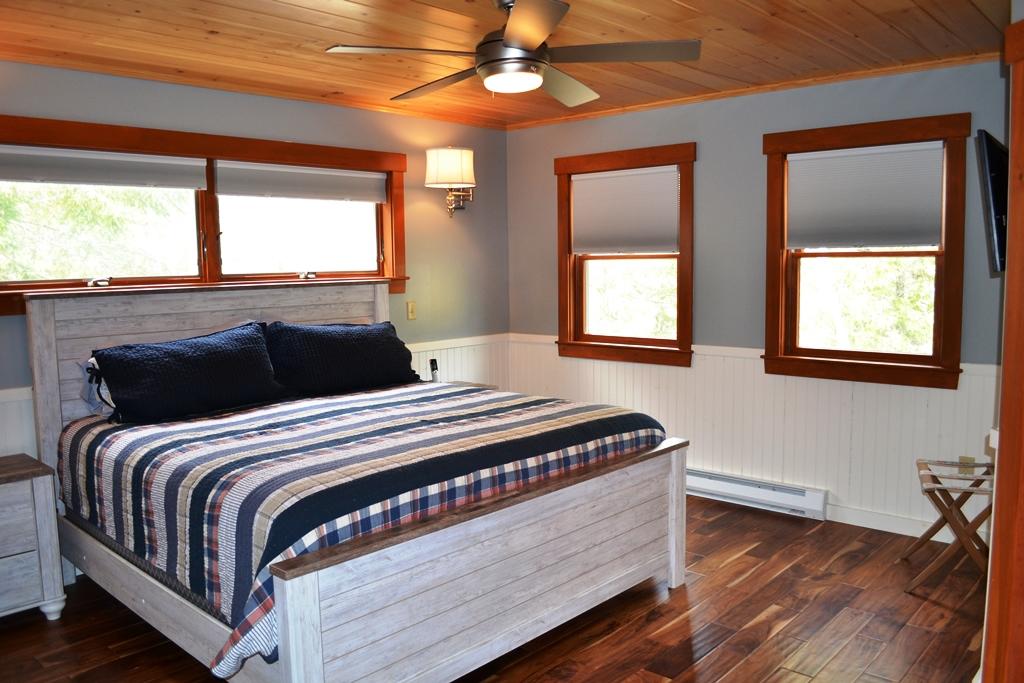 923 Bemis Road Oquossoc, ME 04964 - Photo 21 of 38 Master Bedroom