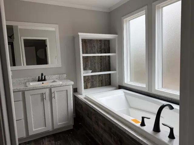 a bathroom with a sink and a bathtub