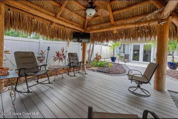 108 Washington Avenue Cape Canaveral, FL 32920 - Photo 28 of 35 a view of a chairs and table in a patio