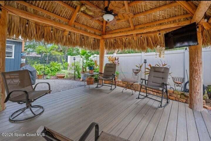 108 Washington Avenue Cape Canaveral, FL 32920 - Photo 29 of 35 a building outdoor space with patio furniture