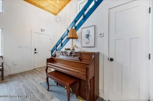 a view of an entryway with hardwood
