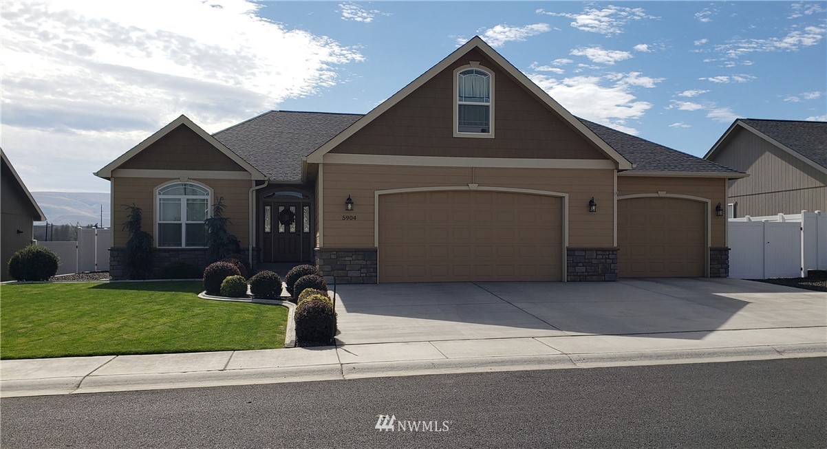 5904 Crestfields Road Yakima, WA 98903 - Photo 1 of 39 a view of a back yard of the house