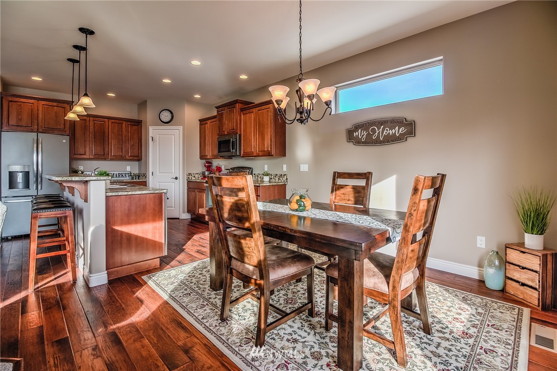 5904 Crestfields Road Yakima, WA 98903 - Photo 15 of 39 a view of a dining area with furniture and a kitchen