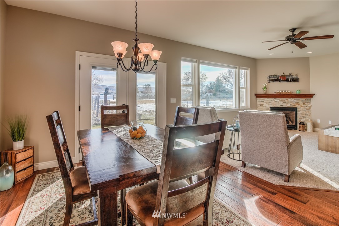 5904 Crestfields Road Yakima, WA 98903 - Photo 16 of 39 a view of a dining room with furniture window and outside view