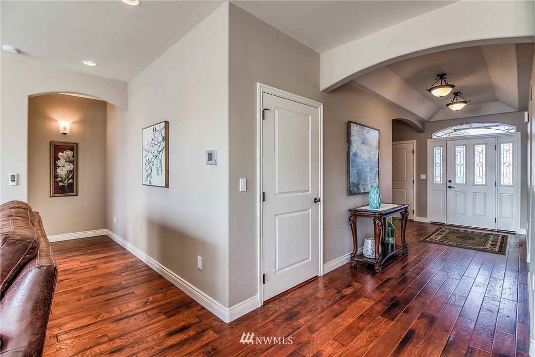 5904 Crestfields Road Yakima, WA 98903 - Photo 20 of 39 a view of a livingroom with wooden floor and cabinet