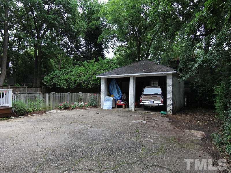 2020 St Marys Street Raleigh, NC 27608 - Photo 23 of 25 a view of a house with a yard and roof