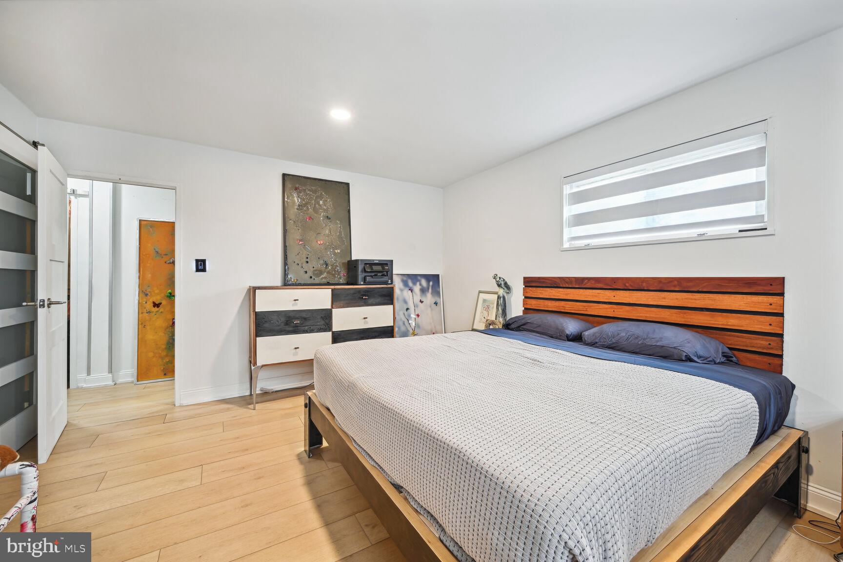 3900 Tunlaw Road Northwest, Unit 604 Washington, DC 20007 - Photo 20 of 37 Primary bedroom - with summer comforter.