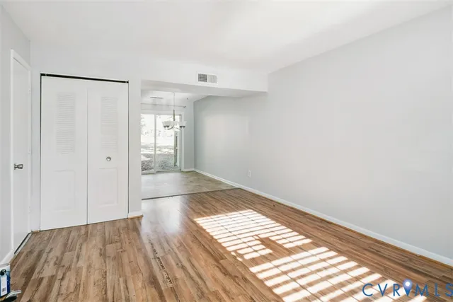 a view of an empty room and window