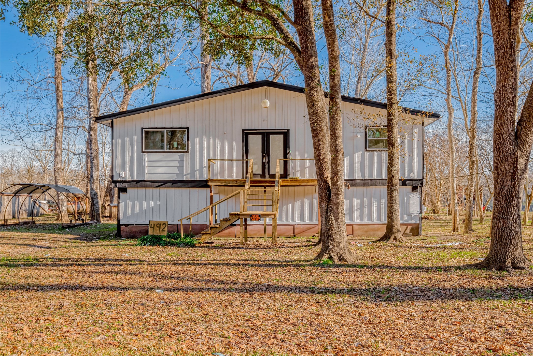 492 Trinity Road Dayton, TX 77535 - Photo 1 of 28 a house view with a outdoor space