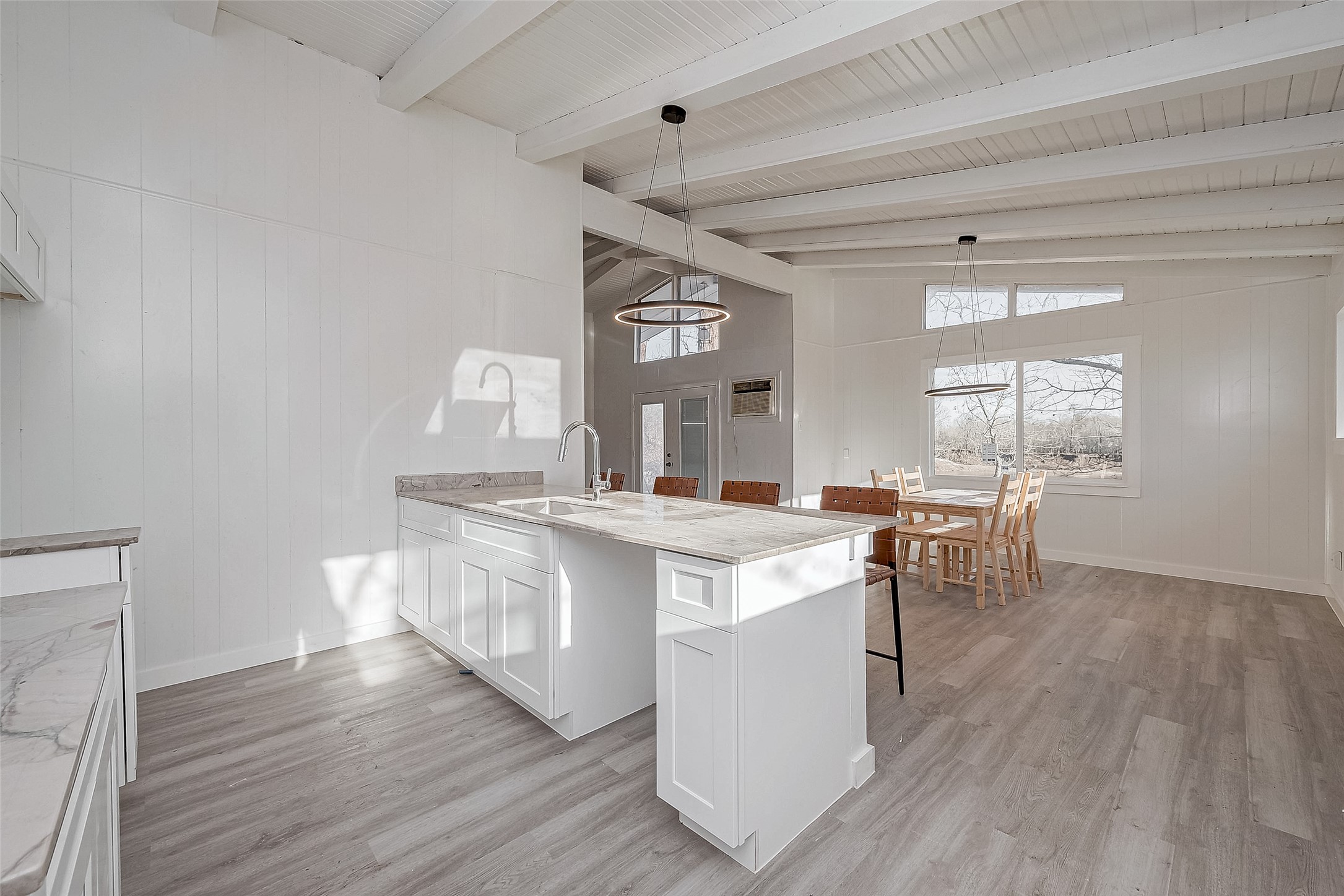 492 Trinity Road Dayton, TX 77535 - Photo 16 of 28 a kitchen with stainless steel appliances granite countertop a white cabinets and wooden floor