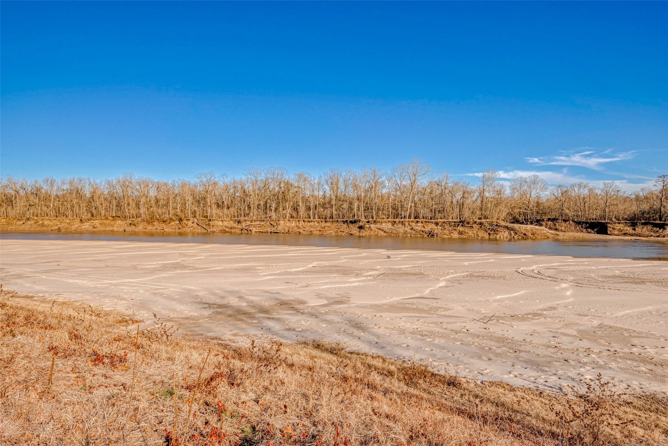 492 Trinity Road Dayton, TX 77535 - Photo 24 of 28 a view of an ocean and a beach