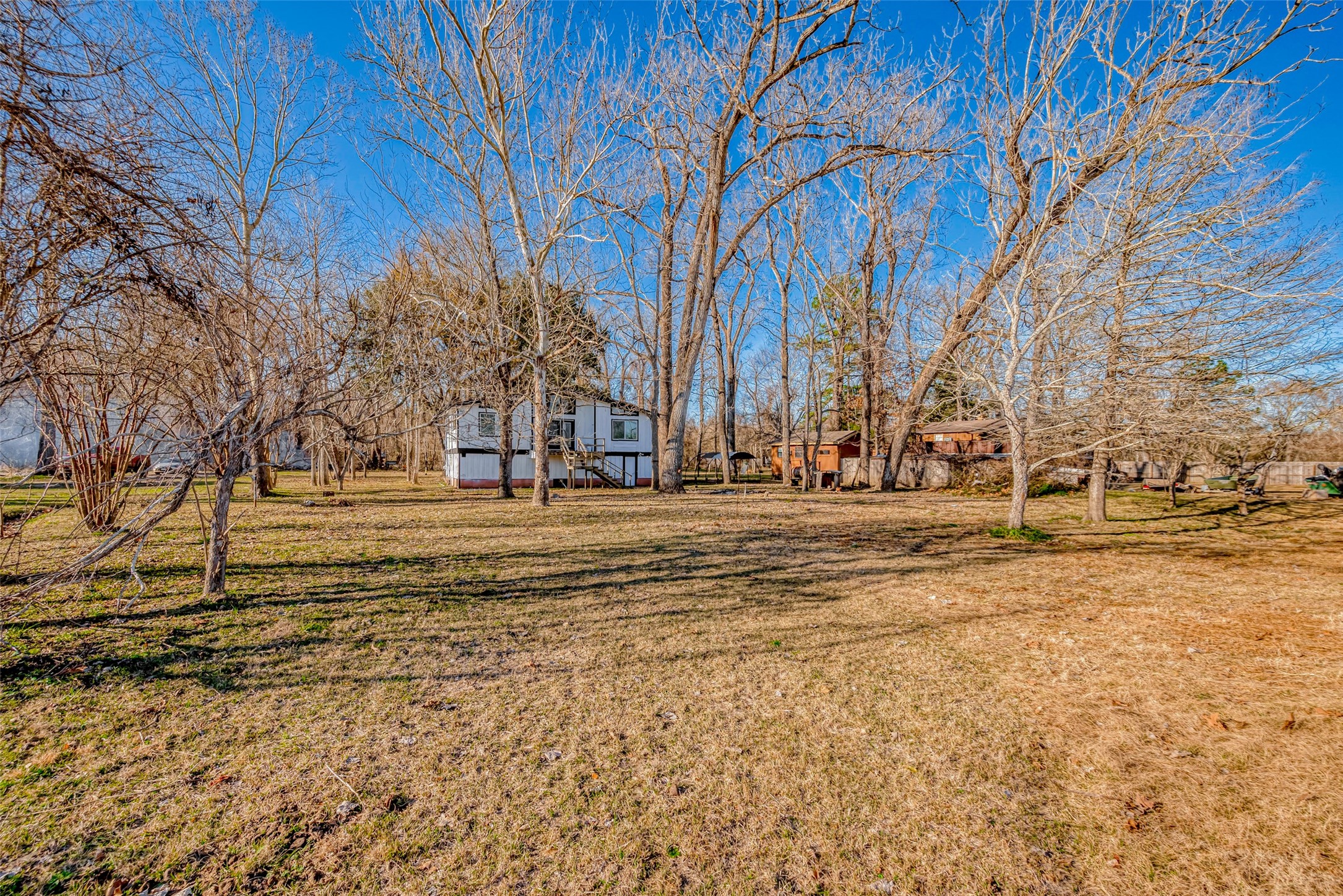 492 Trinity Road Dayton, TX 77535 - Photo 26 of 28 a view of road with trees