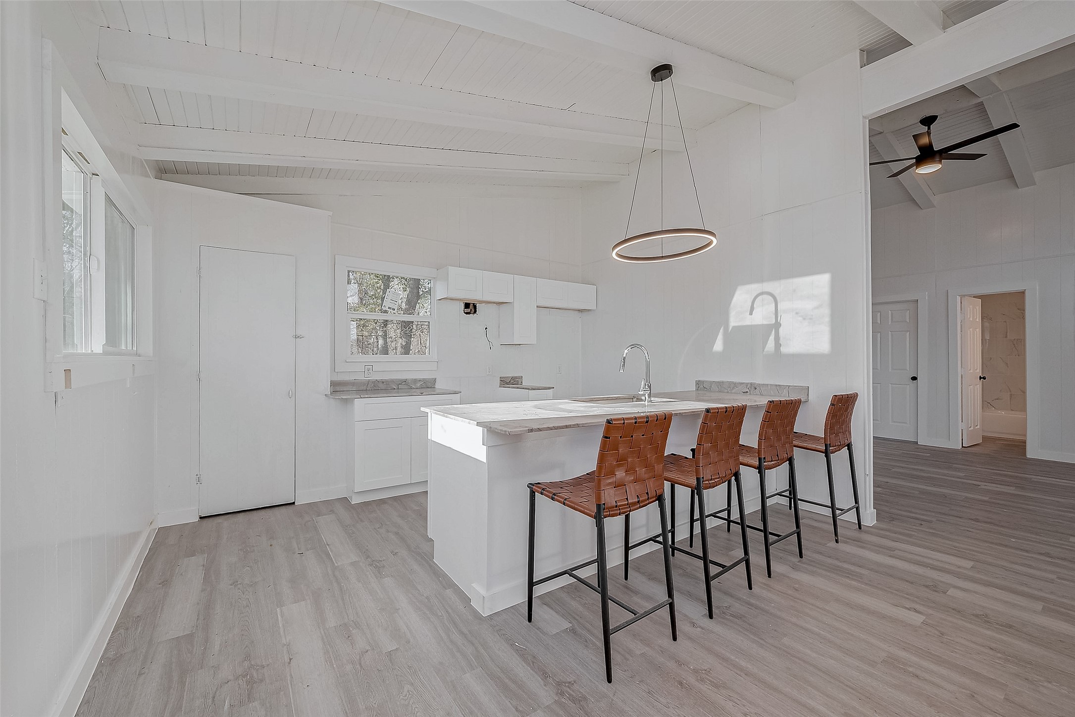 492 Trinity Road Dayton, TX 77535 - Photo 9 of 28 a view of a dining room with furniture and wooden floor
