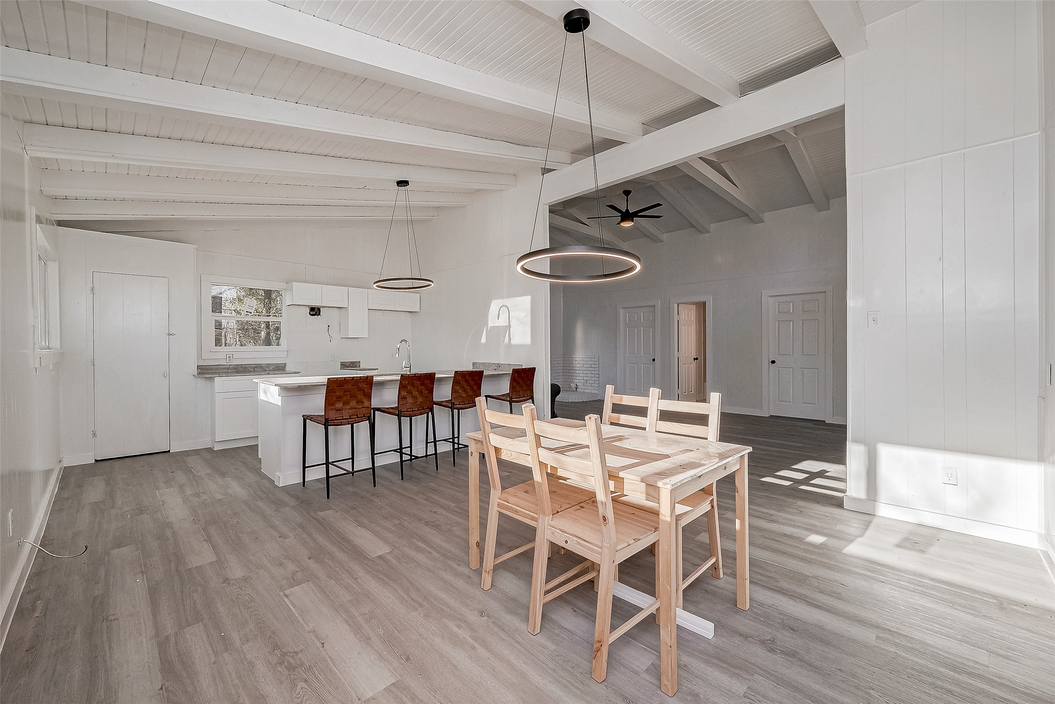 492 Trinity Road Dayton, TX 77535 - Photo 10 of 28 a view of a dining room with furniture and wooden floor