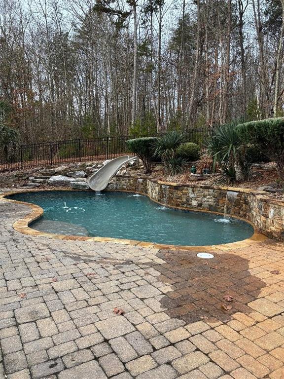 351 Shoals Lane Clarkesville, GA 30523 - Photo 13 of 38 a view of a lake with a yard and covered trees
