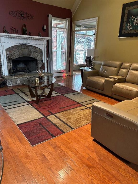 351 Shoals Lane Clarkesville, GA 30523 - Photo 16 of 38 a living room with furniture and a fireplace