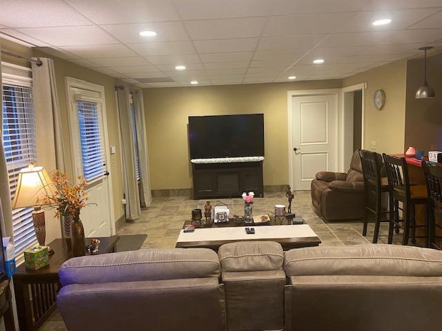 351 Shoals Lane Clarkesville, GA 30523 - Photo 22 of 38 a living room with furniture and a flat screen tv