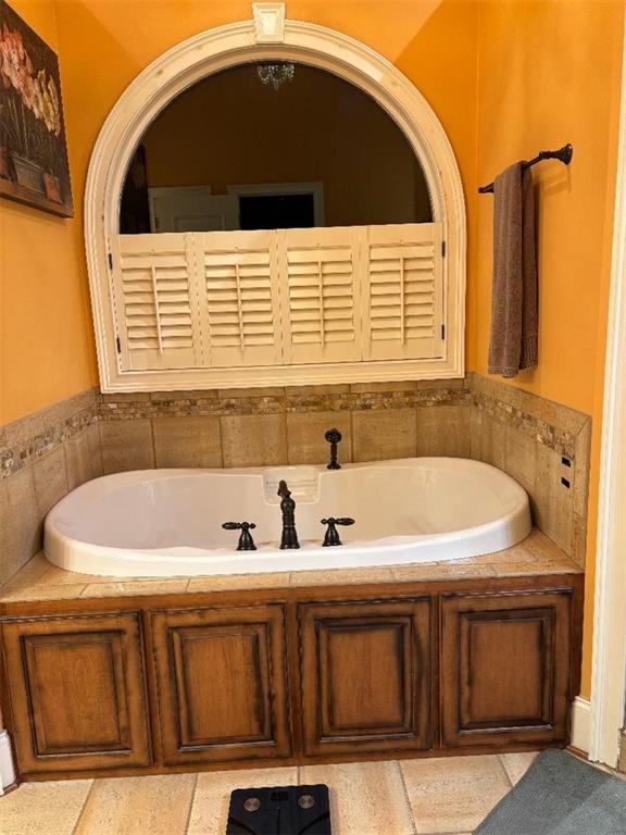 351 Shoals Lane Clarkesville, GA 30523 - Photo 28 of 38 a bathroom with a sink and a bathtub