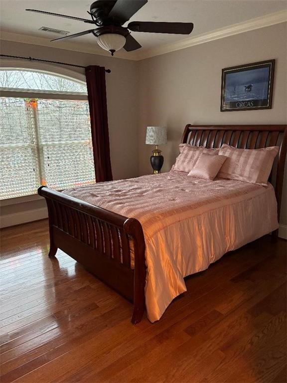 351 Shoals Lane Clarkesville, GA 30523 - Photo 33 of 38 a bedroom with a bed and wooden floor