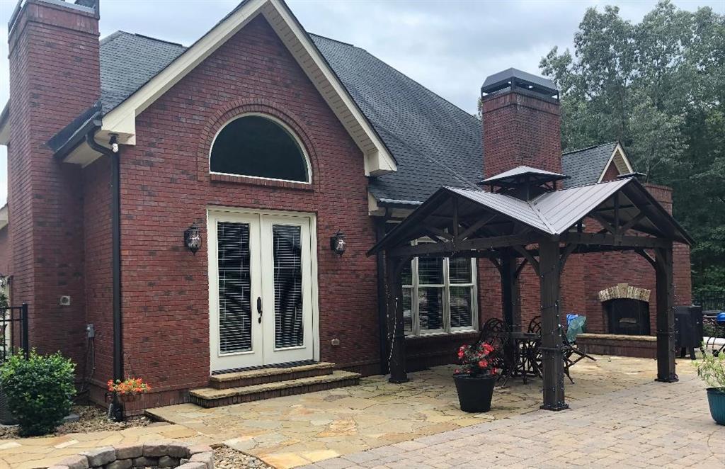 351 Shoals Lane Clarkesville, GA 30523 - Photo 4 of 38 a front view of a house with a yard