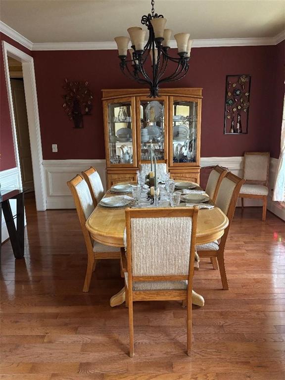 351 Shoals Lane Clarkesville, GA 30523 - Photo 9 of 38 a dining room with furniture a chandelier and wooden floor