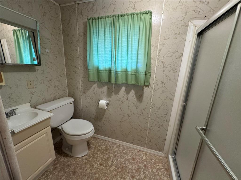 314 Pine Street Ambridge, PA 15003 - Photo 13 of 22 a bathroom with a toilet and a sink