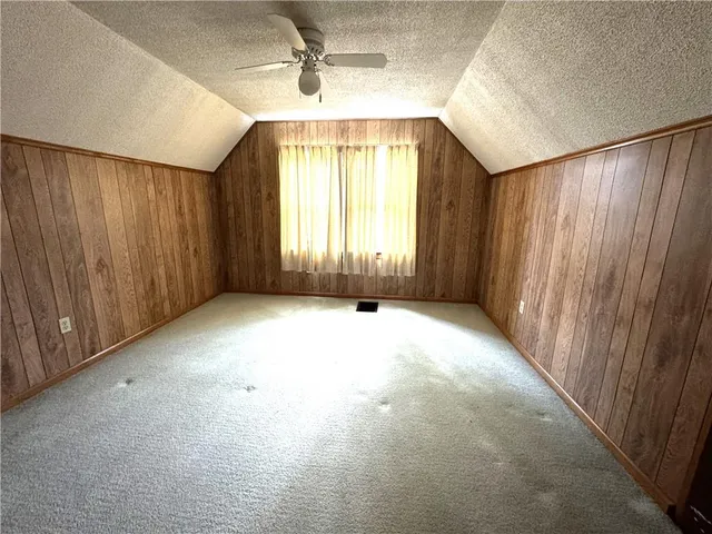 view of hall way with mirror