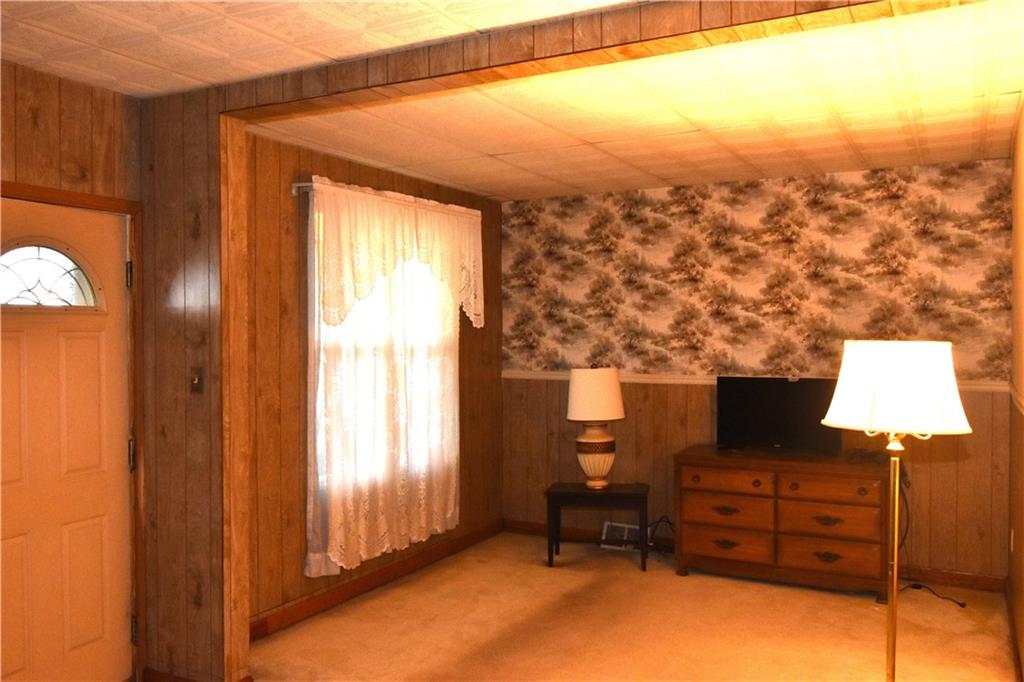 314 Pine Street Ambridge, PA 15003 - Photo 5 of 22 a view of a room with furniture and a window