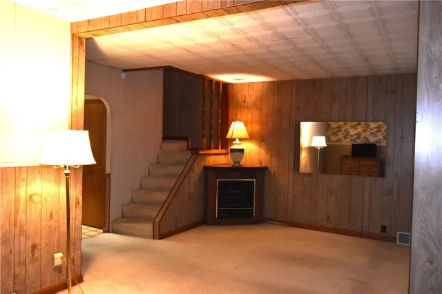a refrigerator freezer sitting inside of a kitchen