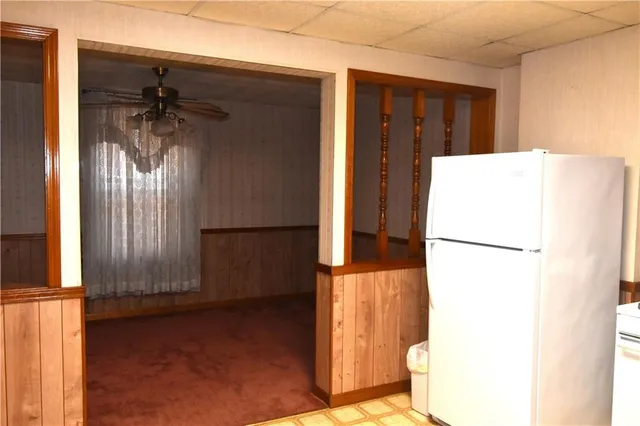 a view of a living room with a large window