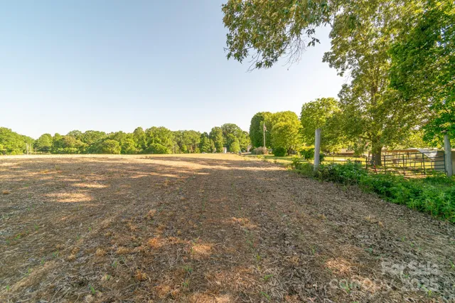 a view of a road with a yard