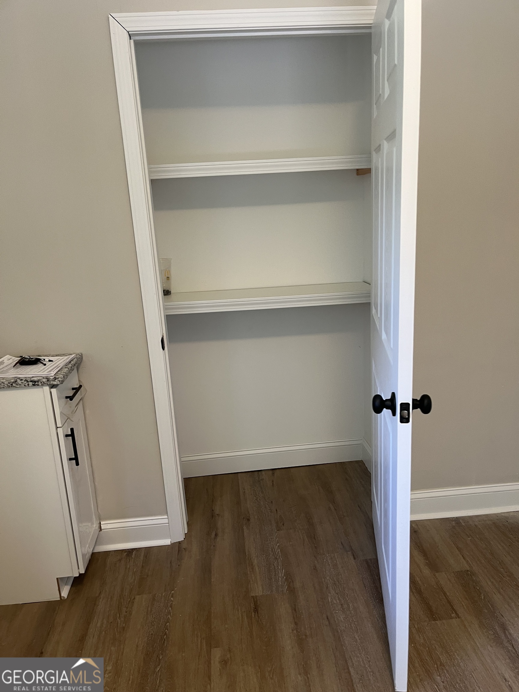 802 J D Parham Drive Manchester, GA 31816 - Photo 13 of 17 a view of a room with wooden floor