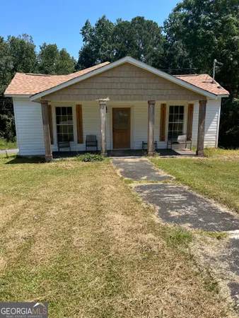 front view of a house and a yard
