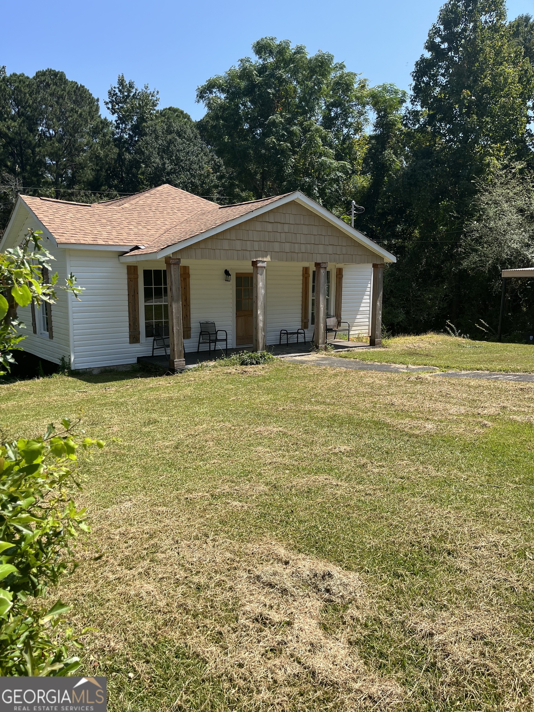 802 J D Parham Drive Manchester, GA 31816 - Photo 3 of 17 a front view of a house with yard and trees