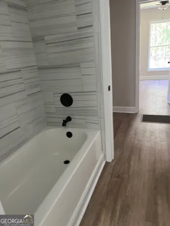 a bathroom with a bathtub