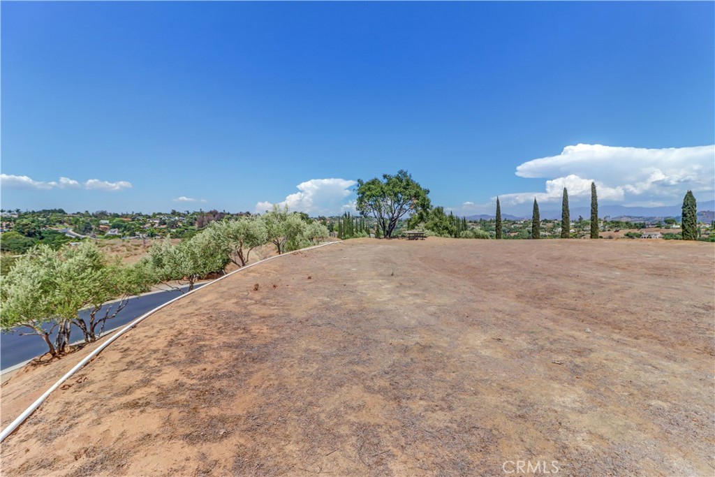 4034 Bridlewood Road Fallbrook, CA 92028 - Photo 14 of 19 a view of a road with a building in the background