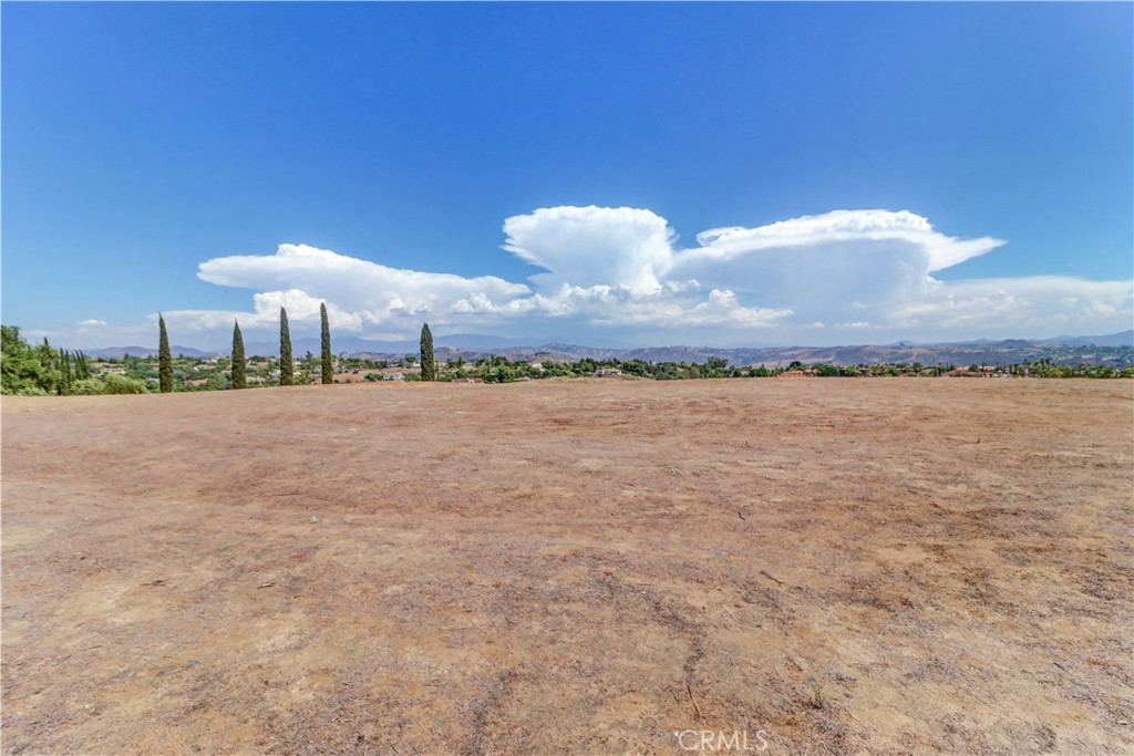 4034 Bridlewood Road Fallbrook, CA 92028 - Photo 15 of 19 a kitchen with a sink cabinets and stove