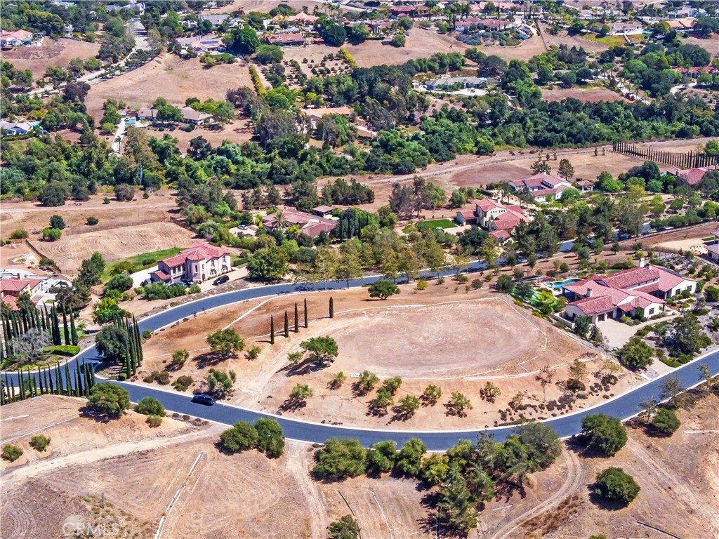 4034 Bridlewood Road Fallbrook, CA 92028 - Photo 16 of 19 an aerial view of a house with a swimming pool yard and outdoor seating