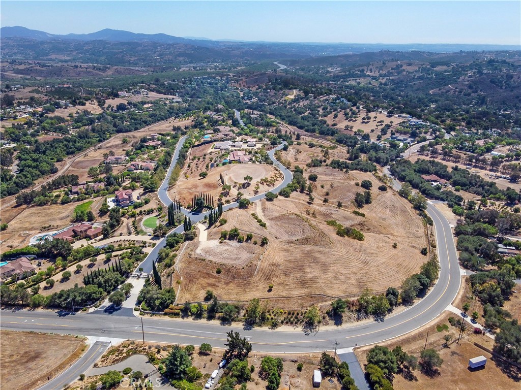 4034 Bridlewood Road Fallbrook, CA 92028 - Photo 2 of 19 an aerial view of residential houses with outdoor space