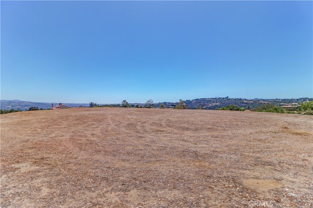 4034 Bridlewood Road Fallbrook, CA 92028 - Photo 8 of 19 a view of lake and mountain