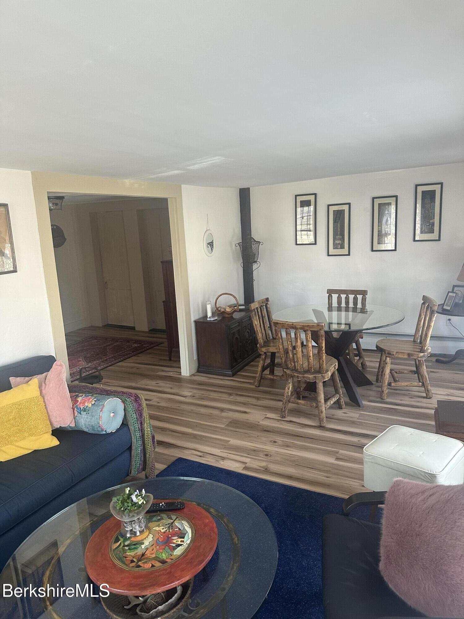 27 North Main Road Otis, MA 01253 - Photo 10 of 24 a living room with furniture and a wooden floor