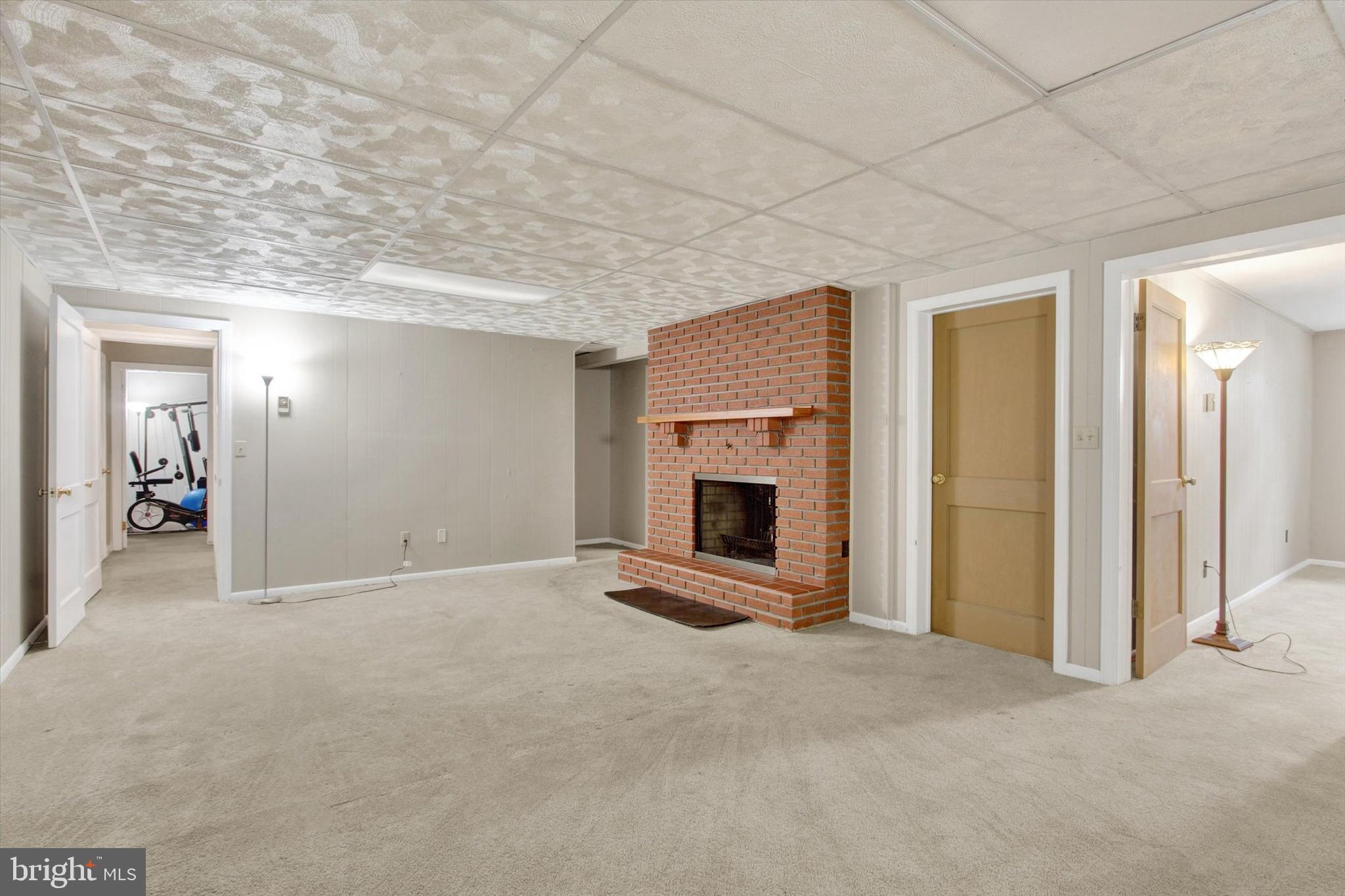 912 Uniontown Road Westminster, MD 21158 - Photo 26 of 33 Finished Basement with Fireplace