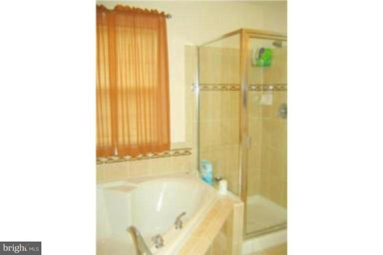 9713 Biggs Road Middle River, MD 21220 - Photo 13 of 18 Featuring Separate Shower & Soak Tub