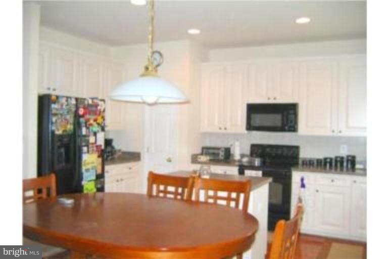 9713 Biggs Road Middle River, MD 21220 - Photo 4 of 18 Lovely Kitchen with Convenient Prep/Eating Counter