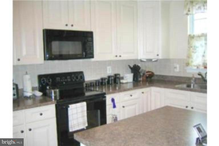 9713 Biggs Road Middle River, MD 21220 - Photo 5 of 18 Fully Equipped with White Cabinetry
