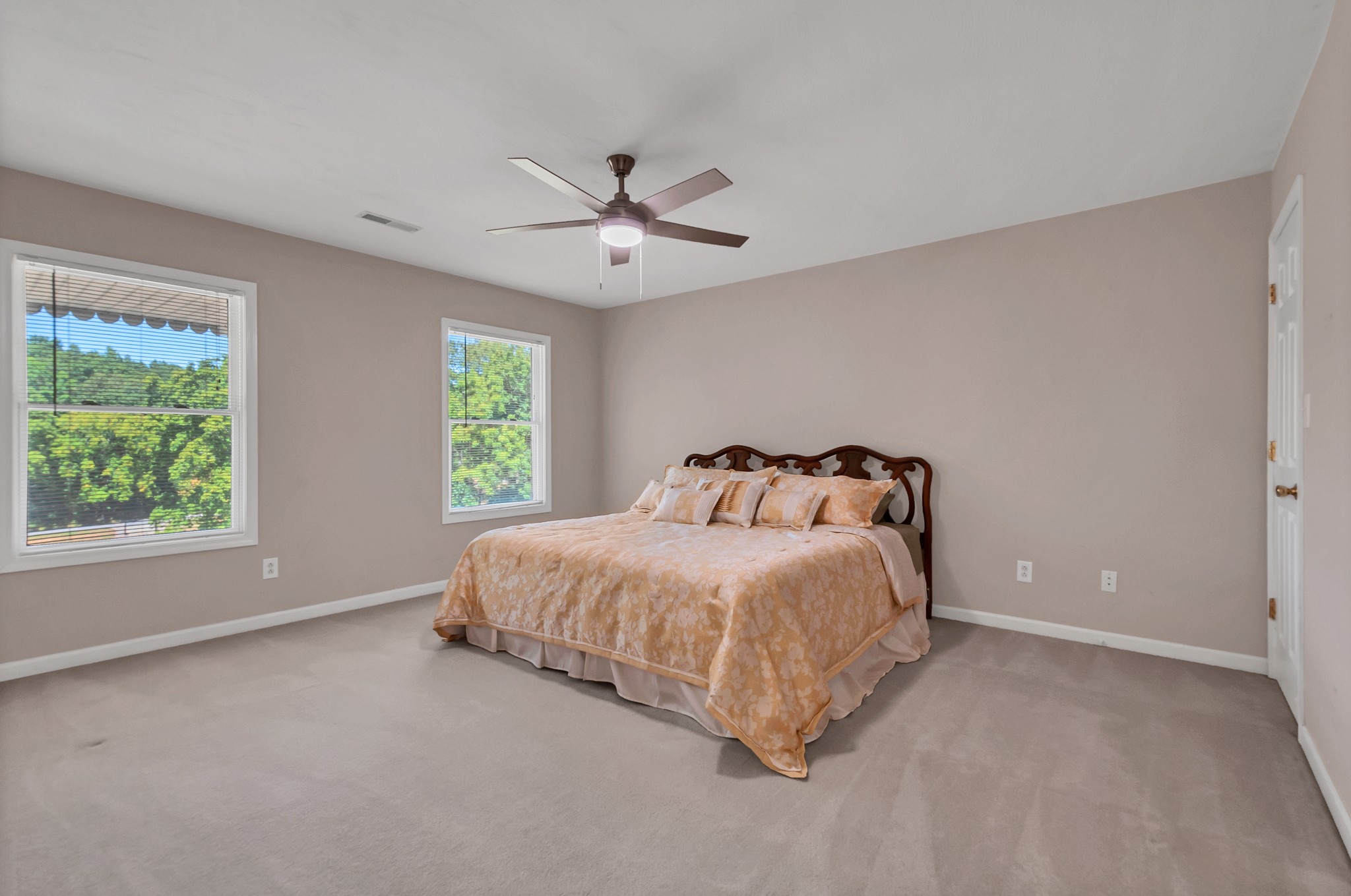 1400 Slaydenwood Road Cumberland Furnace, TN 37051 - Photo 19 of 58 a spacious bedroom with a bed and a window