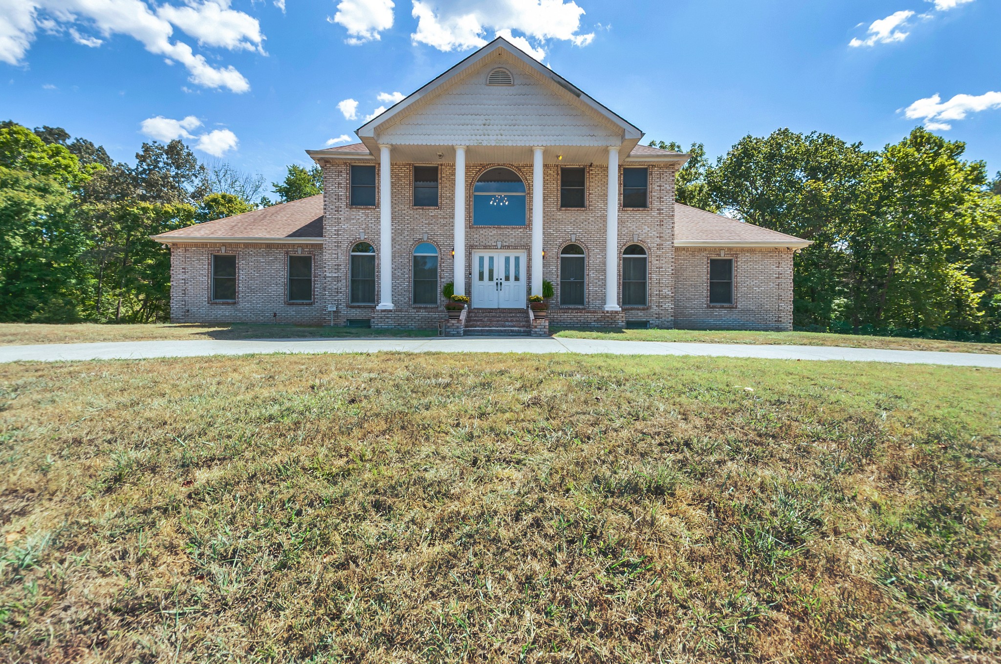 1400 Slaydenwood Road Cumberland Furnace, TN 37051 - Photo 2 of 58 a front view of a house with a yard