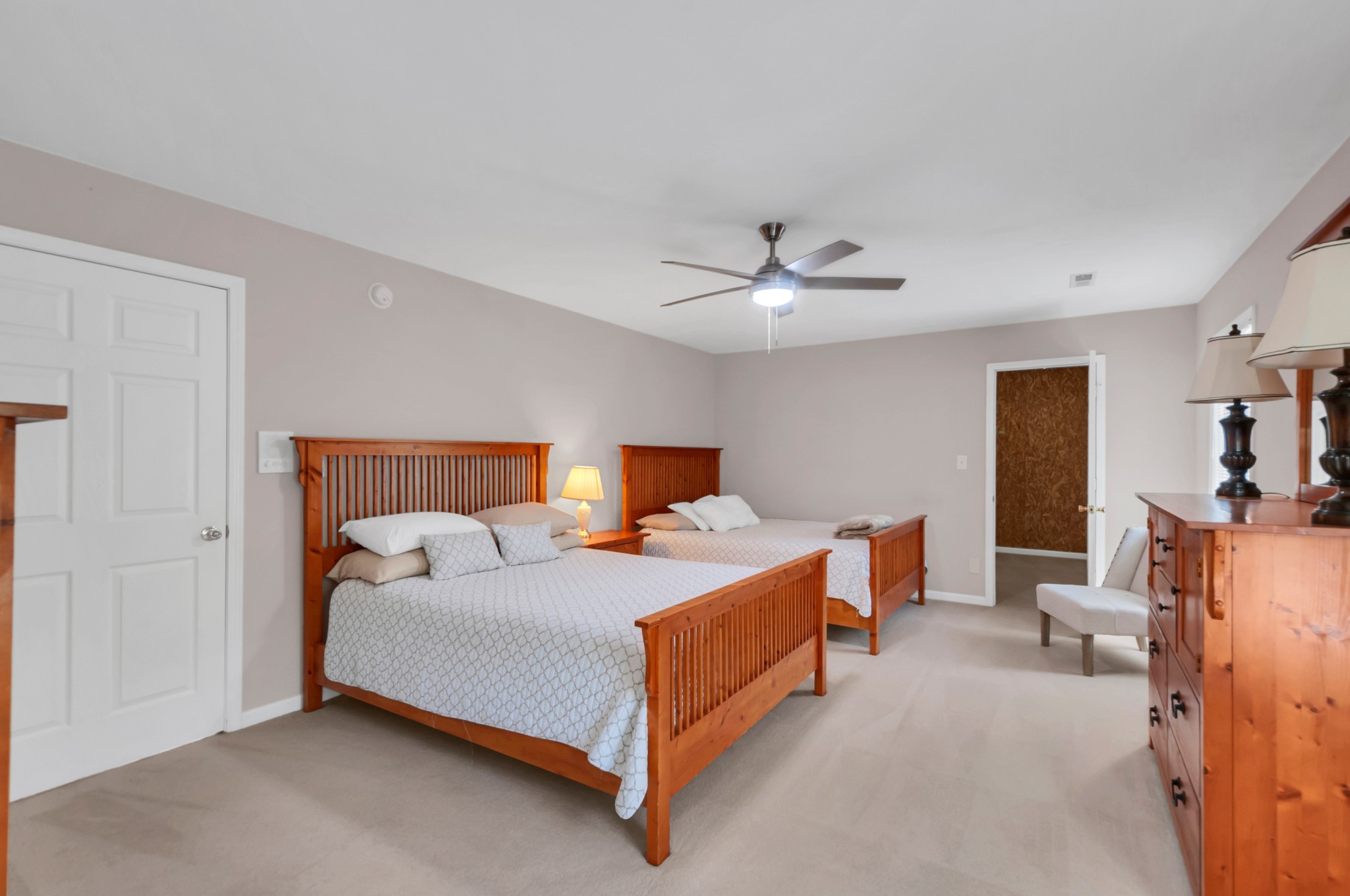 1400 Slaydenwood Road Cumberland Furnace, TN 37051 - Photo 23 of 58 a bedroom with a bed and lamp with window